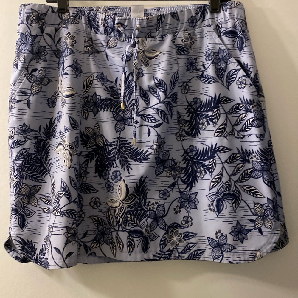 Chico’s skort, light blue with floral, butterfly print. Size 2 similar to large